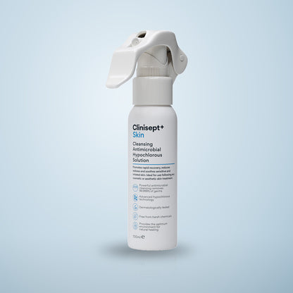 Clinisept+ Skin 100ml, a white trigger spray bottle of cleansing hypochlorous solution, on a pale blue background